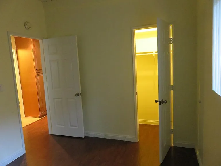 View of closet in bedroom.