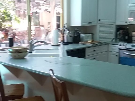 Kitchen next to family room