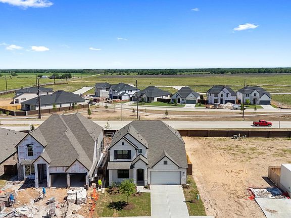 An additional view of the home, lot and neighborhood.