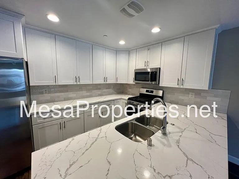 16408 Valencia Ave #311 — Photo 13