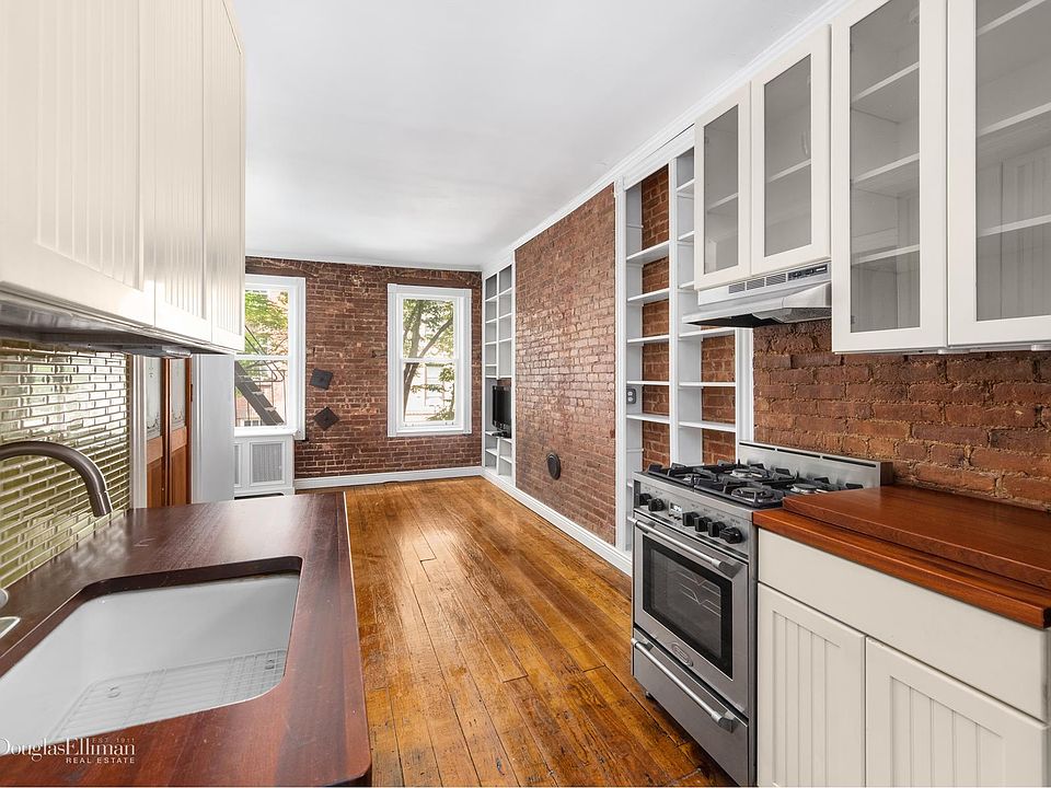 1st image of 140 W 10th St APT 2FE
