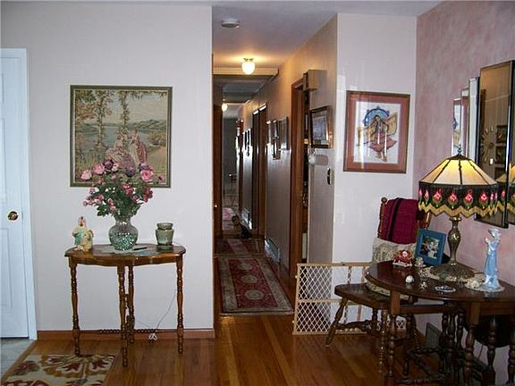 Entry to Formal Living Room, Hallway to Bedrooms and Baths