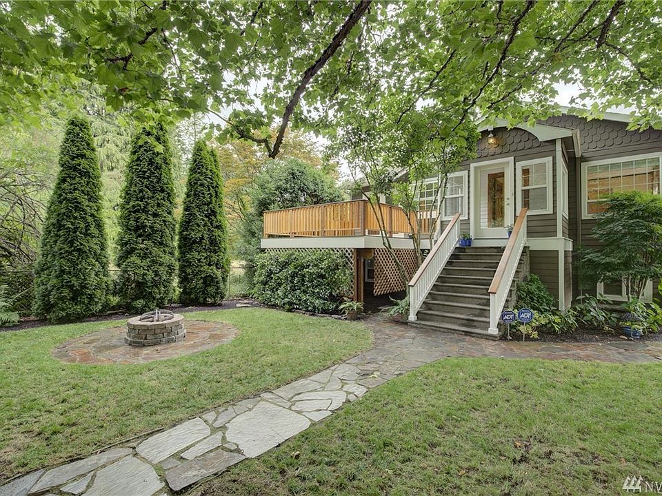 Welcome home! This secluded West Seattle home has impeccable grounds!