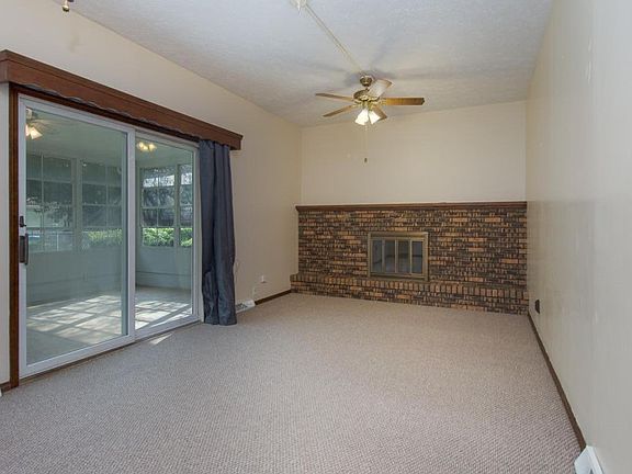 Family room connects to and is open to the kitchen and the three seasons room.