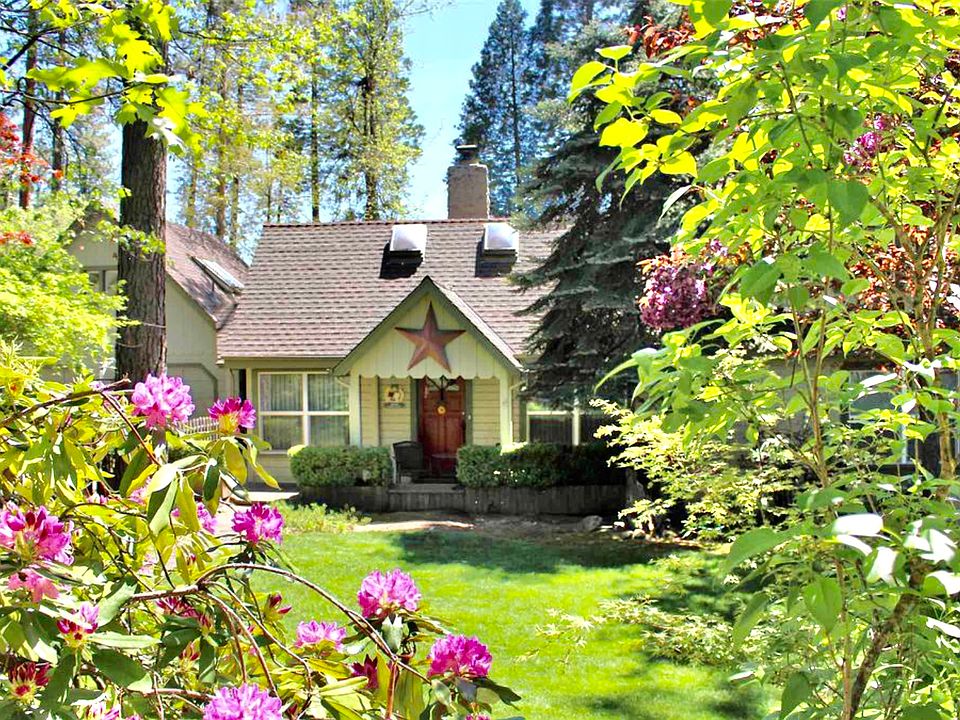 Classic Twain Harte, CA home with spacious interior, gorgeous front and back yards, quiet street but walk to town, lake membership included during summer months and private pool and spa in the backyard.