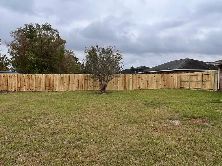 1/4 acre backyard with privacy fence