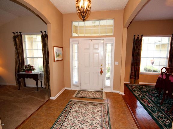 Foyer with tile flooring