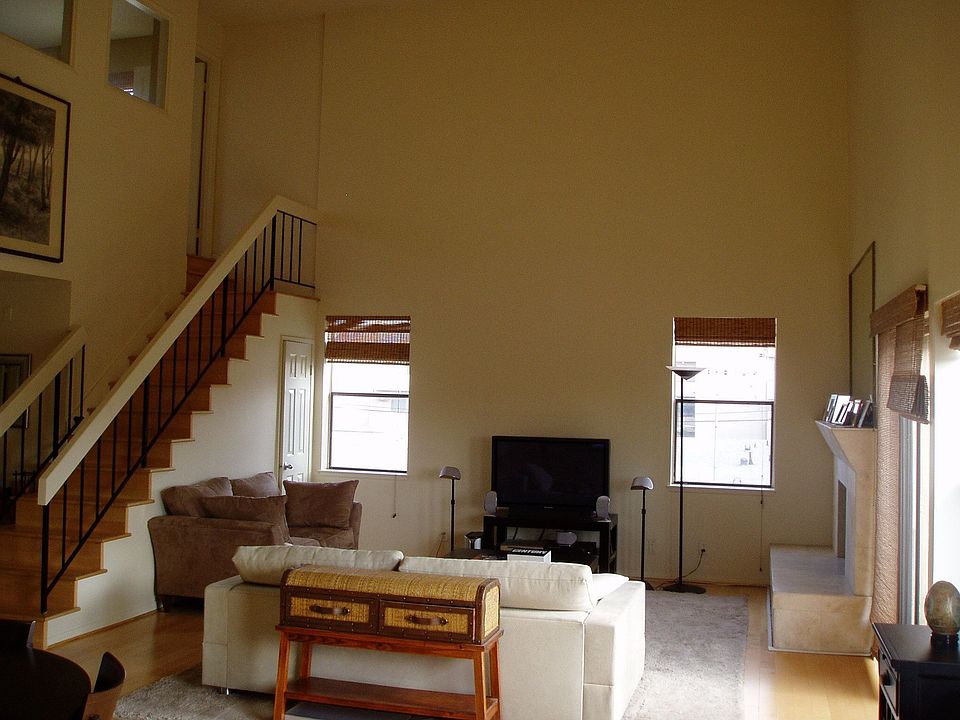living room with lofted ceilings