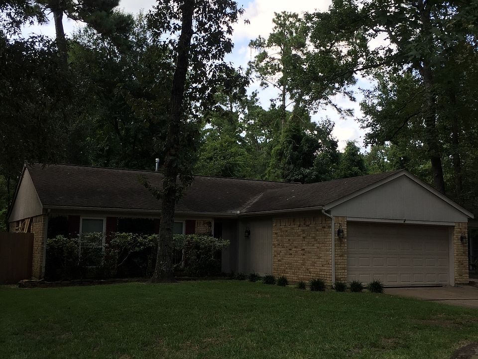 Solid brick home with shade