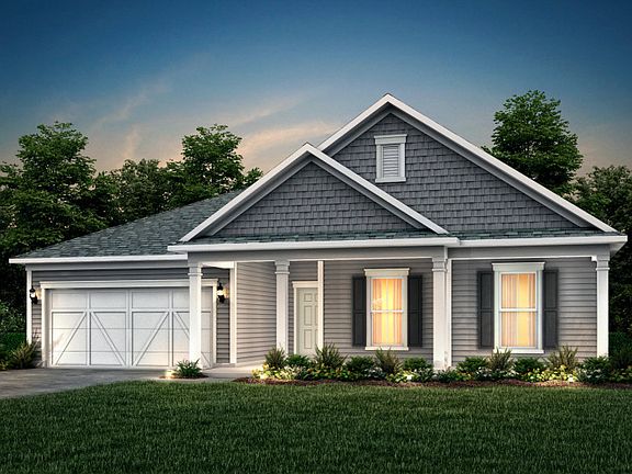 Amberwood Exterior 52 features Hardie Board siding, shakes, covered front porch and 2 car garage