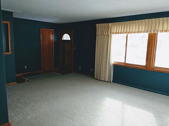 Living room view #2 - planning to update curtains to blinds