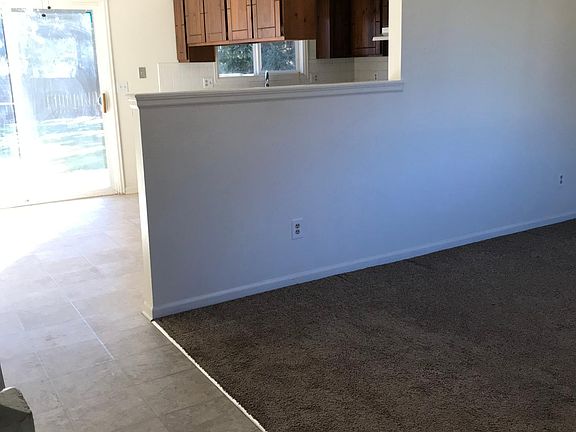 Living room into kitchen and dining areas