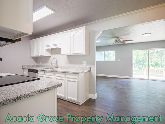 Freshly updated kitchen with new granite countertops, stainless steel range/oven and dishwasher, faucet and updated cabinets. Fridge not included.