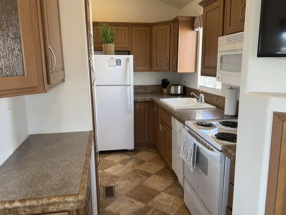 3rd image of 1110 N Henness Rd Lot 915