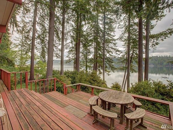 Wood deck in the front of the home with great views of sunrise and Case Inlet. 