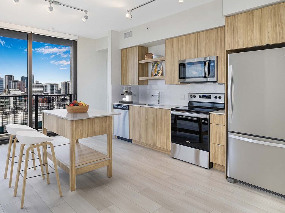 Discover a home with ample natural light and wood floors