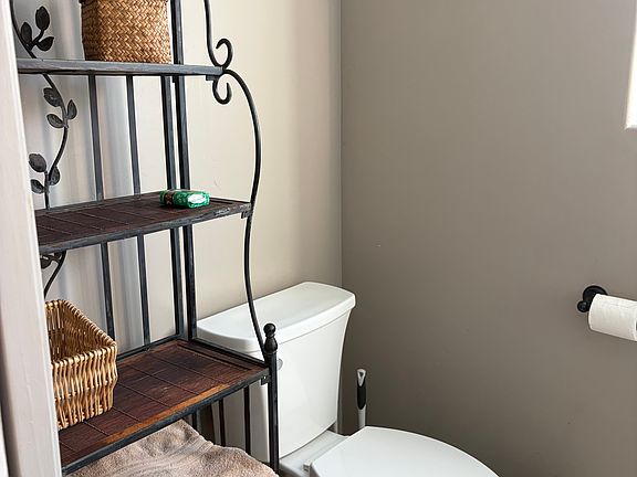 semi furnished bathroom, sliding door for privacy from bedroom.