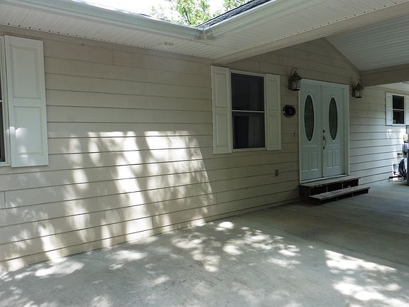 Has Carport And 2 Car Garage!