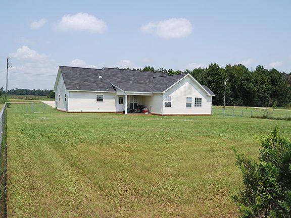 Backyard view of house
