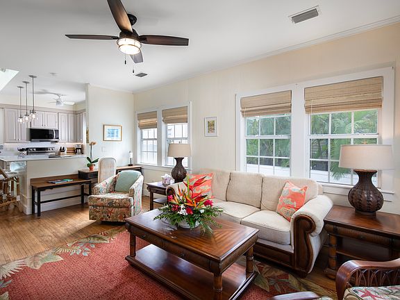 Open style living room with pull out sleeper couch.