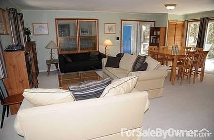 Living/ Dining areas of Great Room
						:
						Breezeway seen through far window and door has been repainted. See Picture #3.