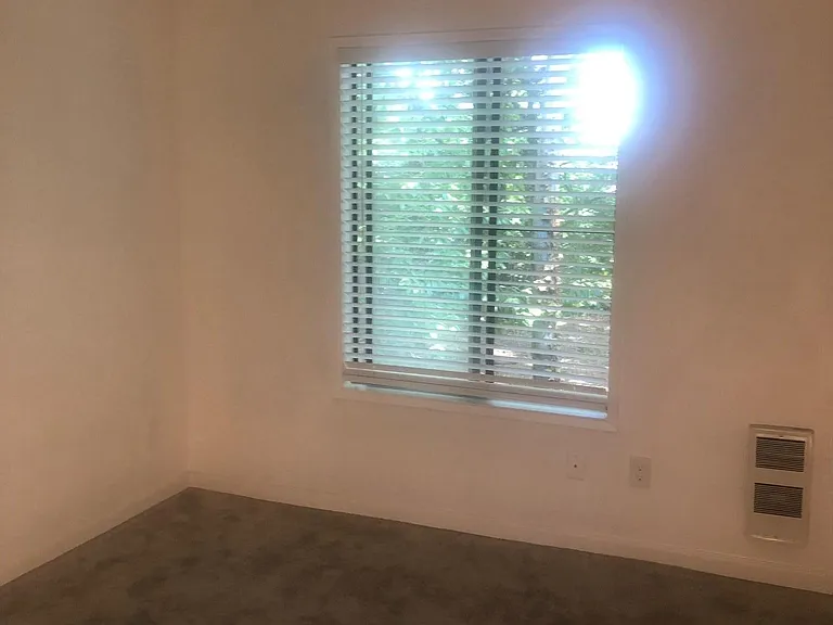 bedroom 1 12 x 14 with double mirror closet