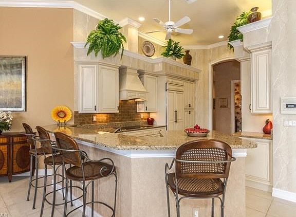 Kitchen with Quartz Counters and Custom Cabinets