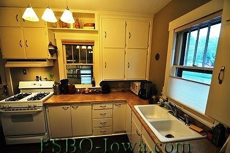 Kitchen - new lighting and bamboo floors, gas stove, dishwasher, southern exposure