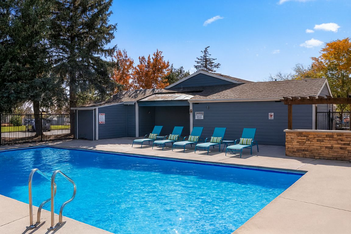 Antero Apartments Pool Deck with Sun Chairs