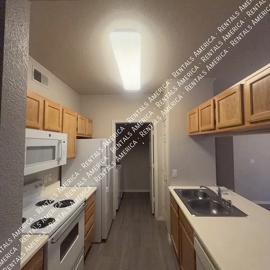 Spacious 3RD Floor 1 BD 1BA Condo in the Gated Red Rox Community! — Photo 1
