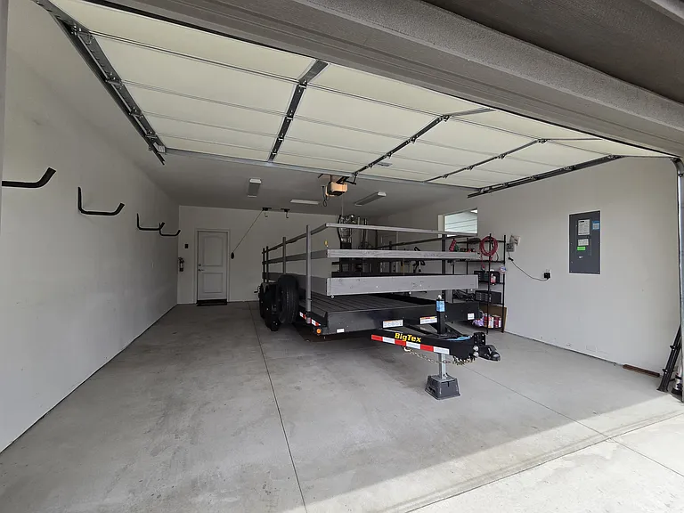 DEEP TWO CAR GARAGE.
(TRAILER TO BE REMOVED BEFORE LEASE BEGINS).