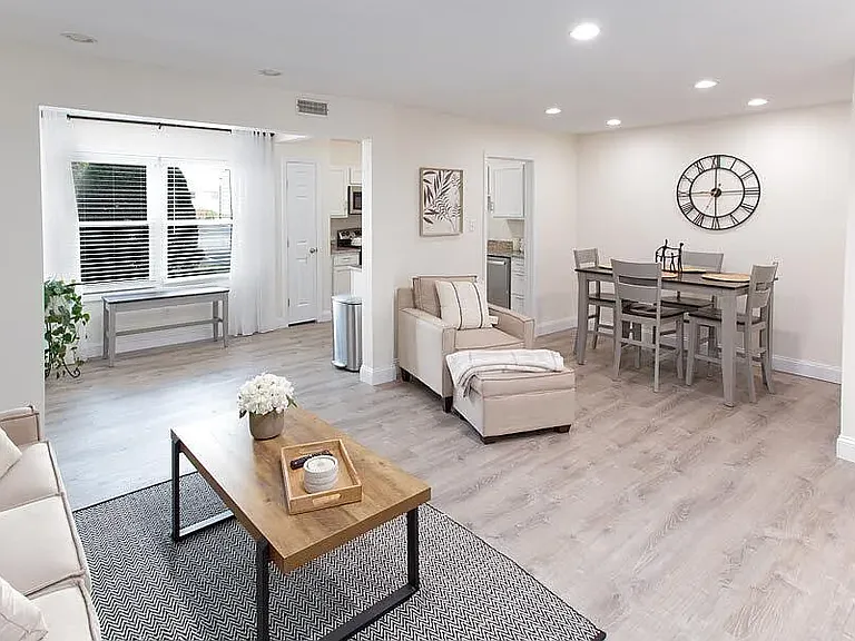 LIVING/DINING AREA IN COOLIDGE FLOORPLAN - ONE BEDROOM - MODEL APARTMENT