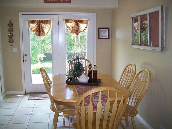 Cute dining area in kitchen and right off the deck.