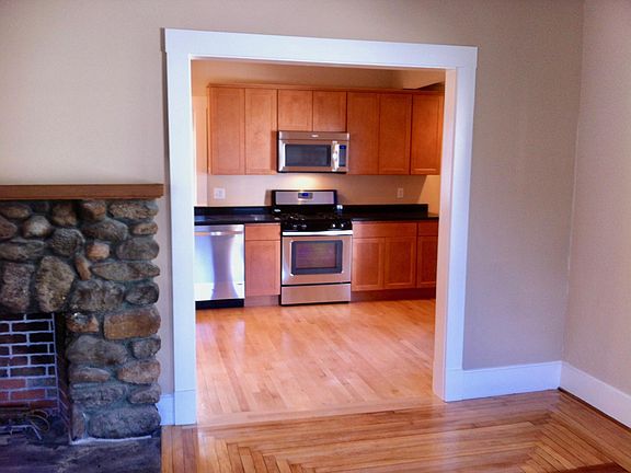 Living room opens to kitchen