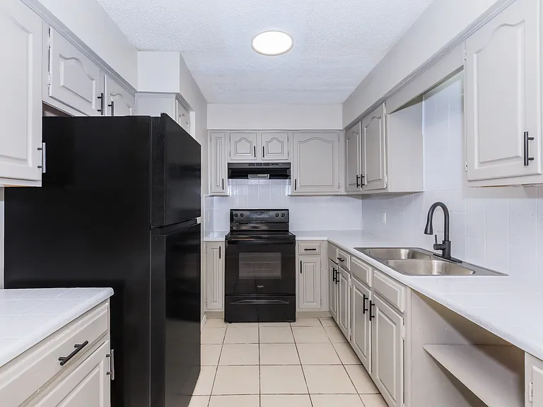 Kitchen to our 2 bedroom matching beautiful appliances new sink/faucets amazing counter tops