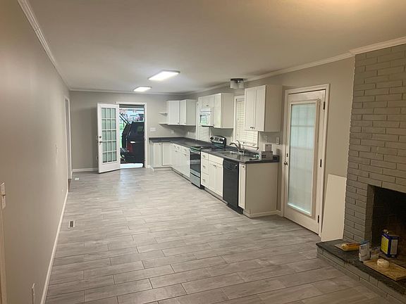 View of kitchen/sitting room. Will be adding a mobile center island.