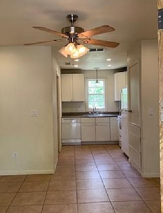 Kitchen: stove, refrigerator, dishwasher, disposal, microwave.