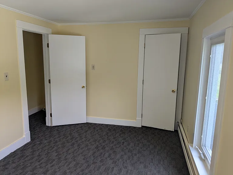 12x20 bedroom with two closets.