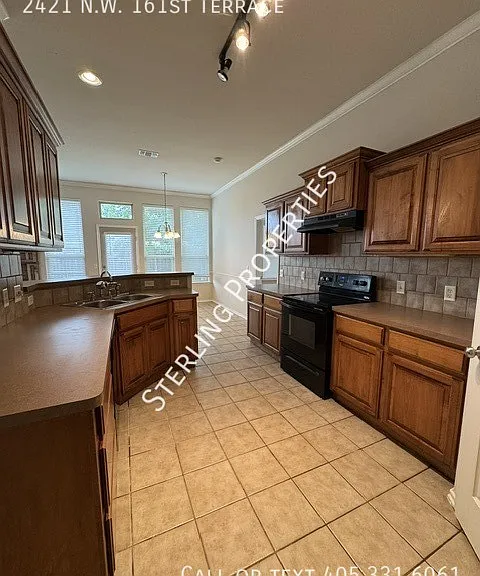 2421 NW 161st St — Photo 7