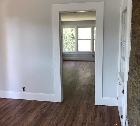 Looking into one of the bedrooms from the back sun room. La