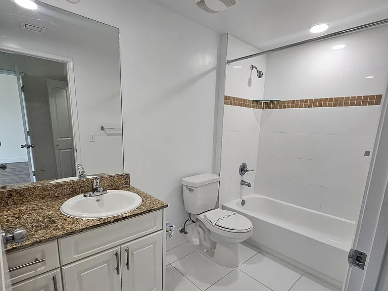 Bathrooms with Granite Counter tops and Large Tubs