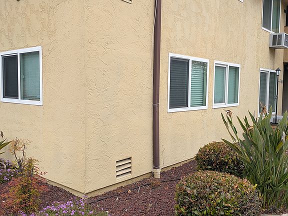 Exterior view of double paned bedrooms and living room windows