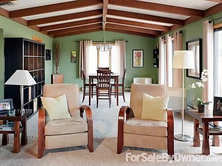 Spacious Living Room
						:
						With 3 SGD's looking out to property
