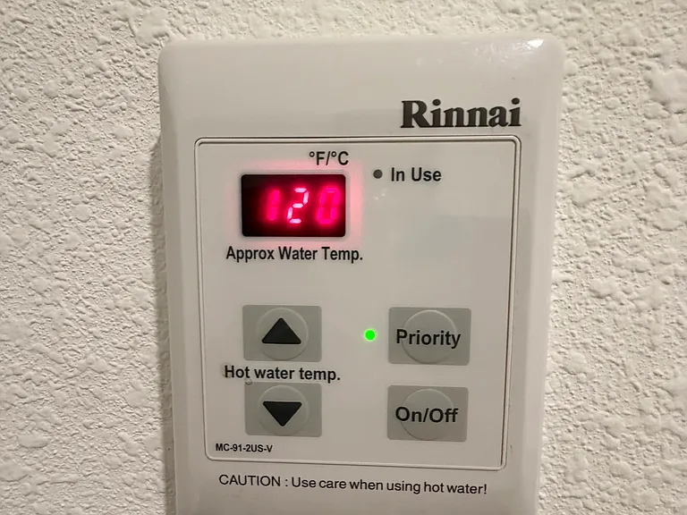 Control Panel for tankless water heater located in master closet