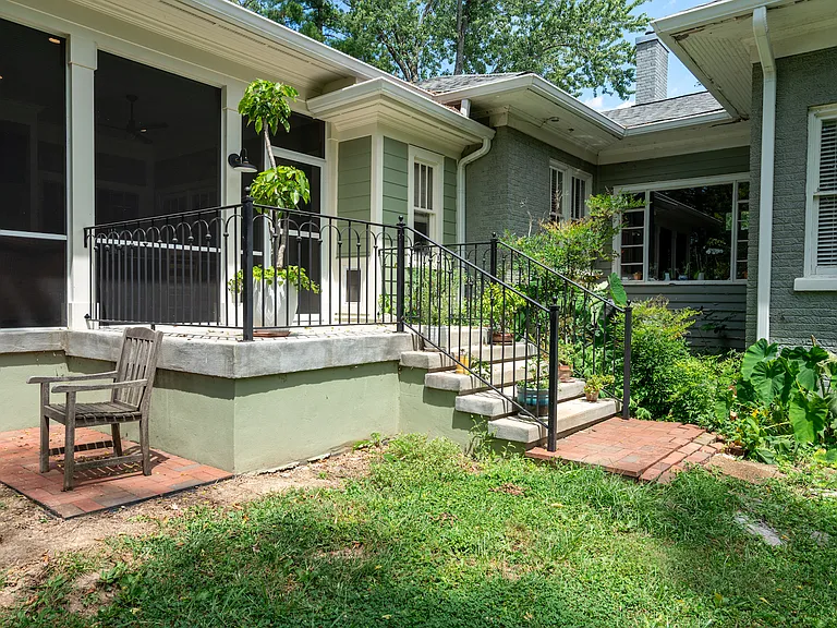 Landing outside screened-in porch