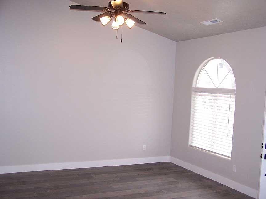 New flooring lights, paint, blinds in living area
