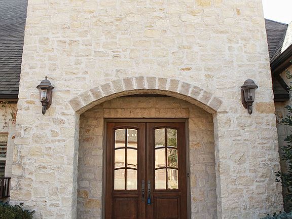 Elegant Stone Entry welcomes you to this home