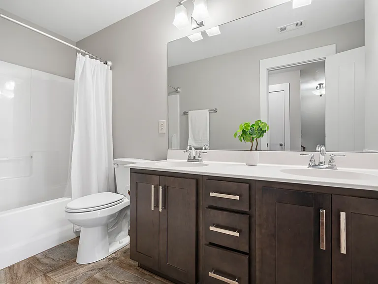 Spare bathroom upstairs that connects to the second spare bedroom.