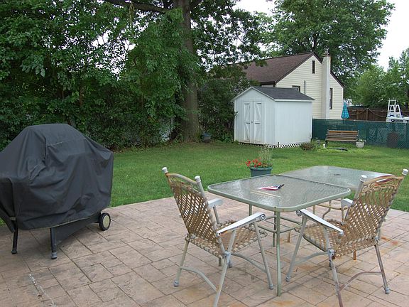 Backyard with stamped concrete patio 18ftx18ft.