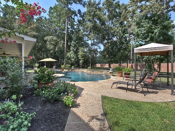 Lush landscaping and shady spots to sit make this outdoor entertainment area a delight for all ages.